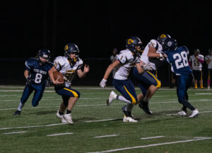 Cameron's Isaac Ball racks up 313 yards and four touchdowns rushing to lead the Dragons past Clay-Battelle